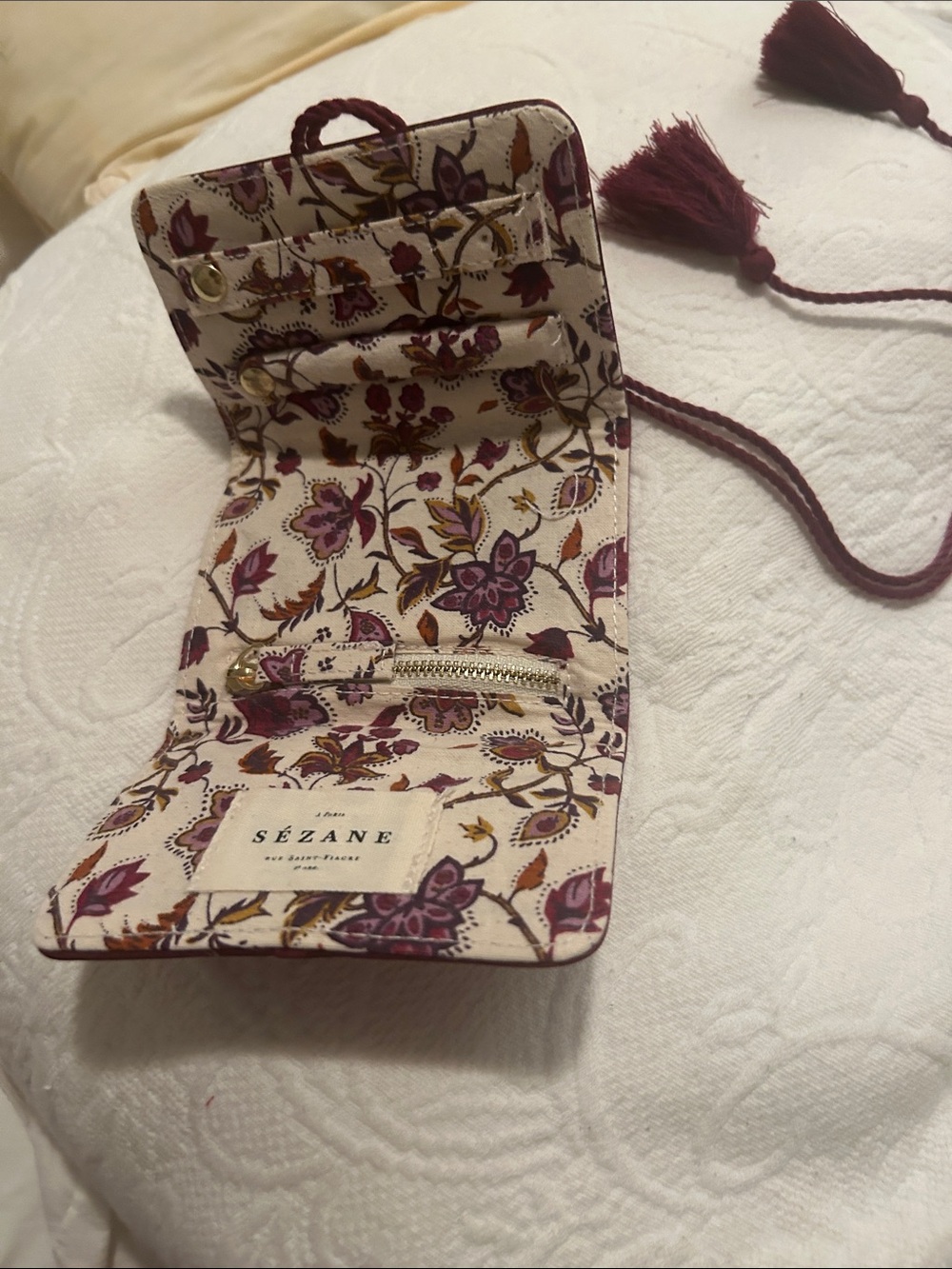 Sézane Cream Floral jewelry organizer with Burgundy Tassel Strap
